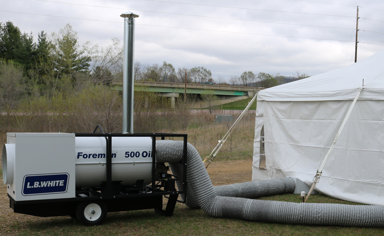 Foreman Oil heater heating an emergency tent.